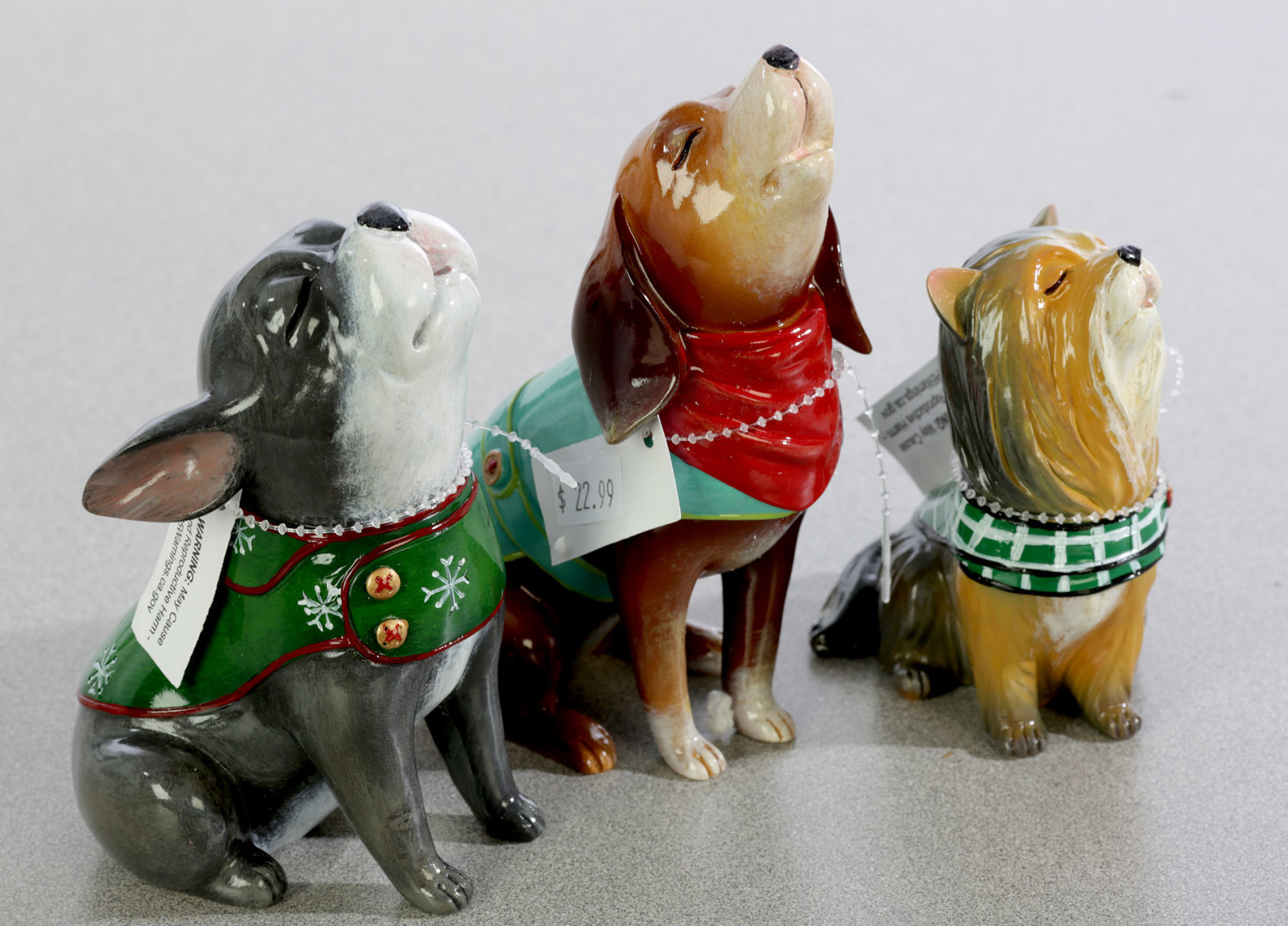 Holiday singing dogs figurines